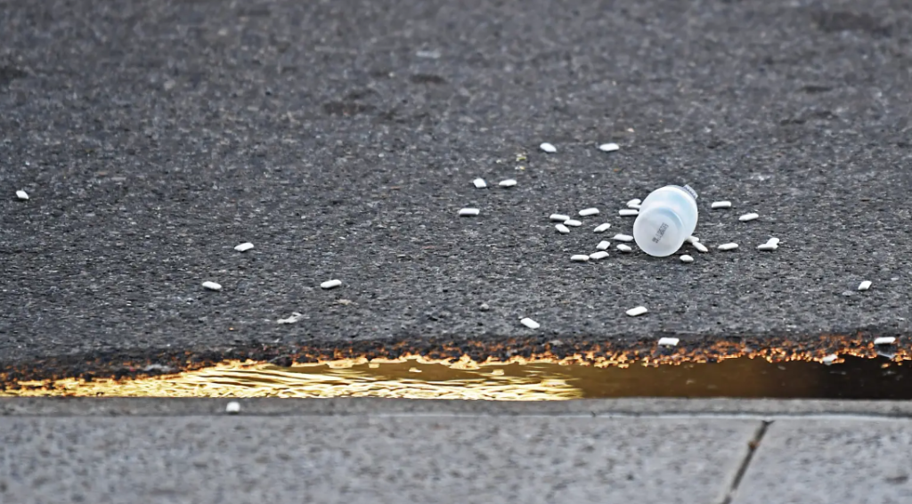 A spilled container at the scene of the shooting